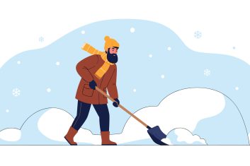 A Person Shoveling Snow On A Cold Winter Day.